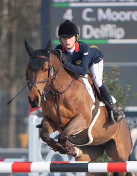 Claudia Moore finishes second in Pony Grand Prix at the FEI Jumping Nations Cup Youth Finals